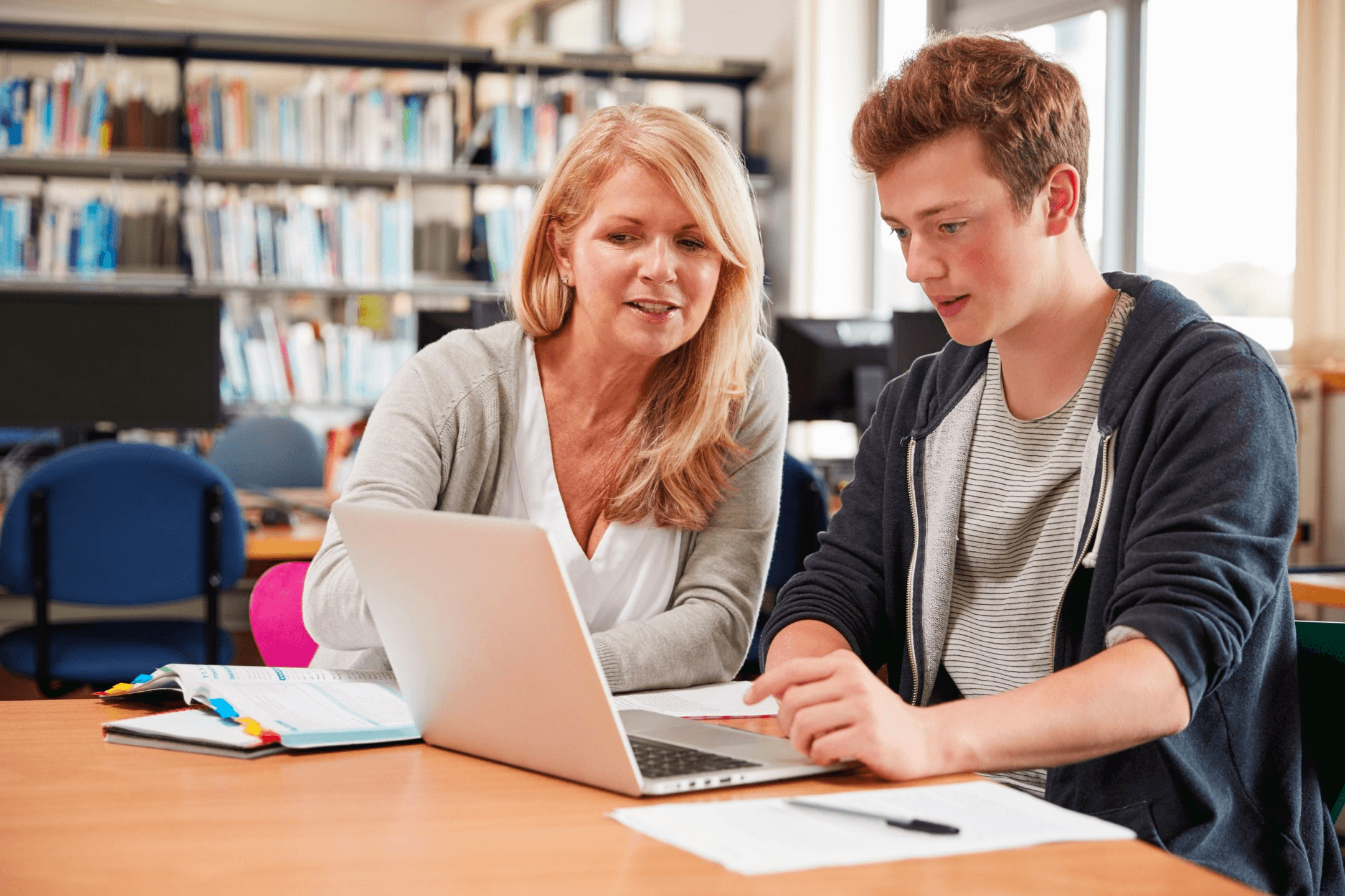 Professor Reviewing Work